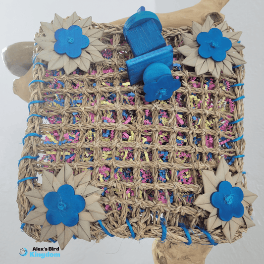 Seagrass mat bird toy with crinkle paper and rope, designed for large parrots like African greys and Amazons