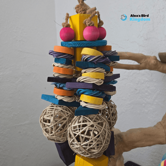 Handmade Tropical Retreat bird toy with coconut fiber rope, pine blocks, vine bulbs, and wood beads, designed for large parrots like macaws and cockatoos